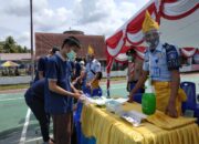 Tarik Minat Pemilih, Petugas TPS Lapas Kelas IIB Pariaman Pakai Tema Adat Minangkabau