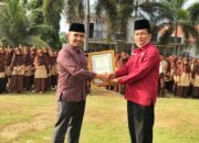 Rizal Effendi Dinobatkan Sebagai Kepala Sekolah Terbaik Tingkat Dharmasraya