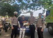 HUT Lalu Lintas, Satlantas Polres Dharmasraya Bagikan Sembako kepada Masyarakat