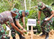 Tim Wasev Tanam Pohon di Lokasi Pembukaan Jalan TMMD