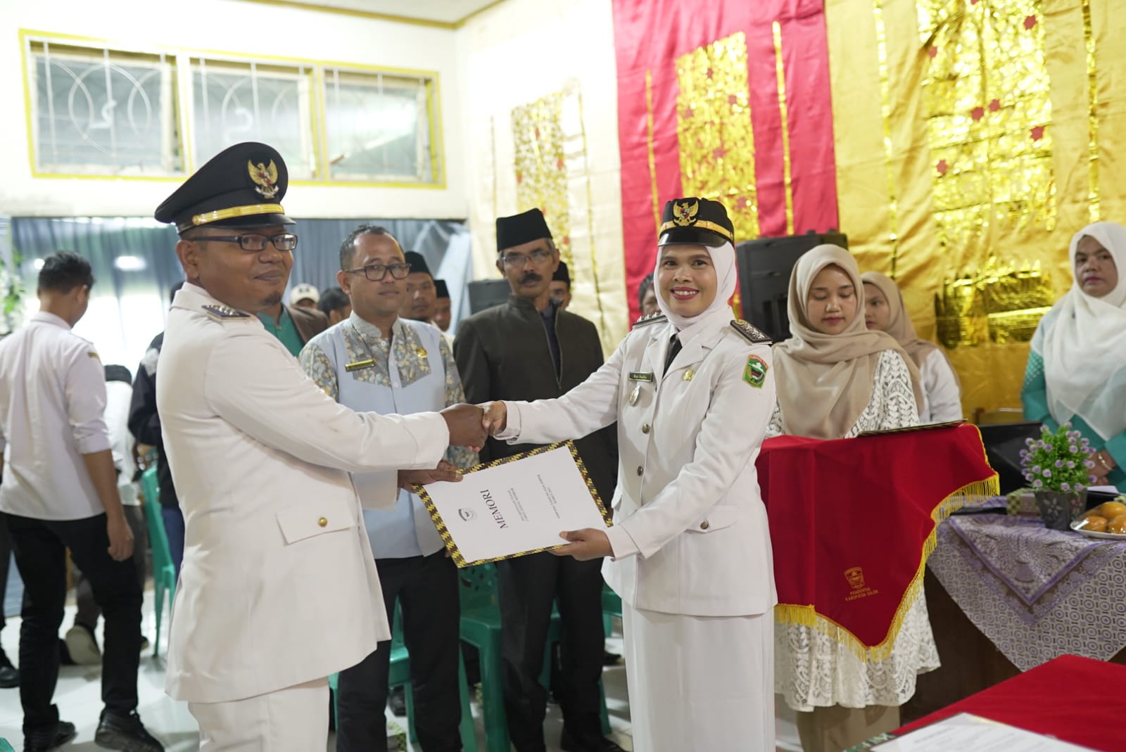 mawardi camat danau kembar